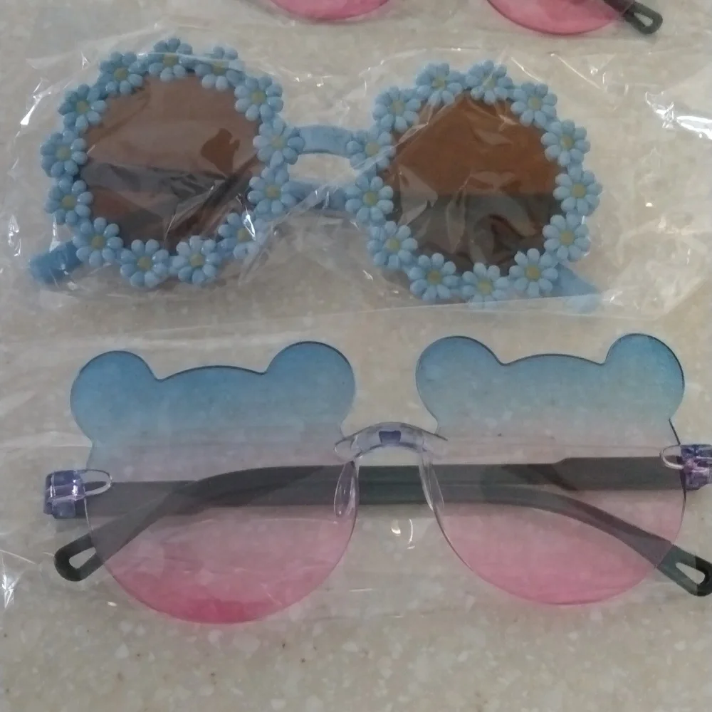 Cool kids sunglasses bundle. Daisies and teddy bears. While they last nw…